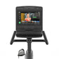 Matrix Endurance Recumbent Cycle with black frame, touchscreen display showing workout interface, and attached foot pedals on