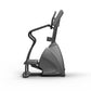 Matrix Endurance Stepper exercise machine with gray frame, curved handrails, and digital display on white background