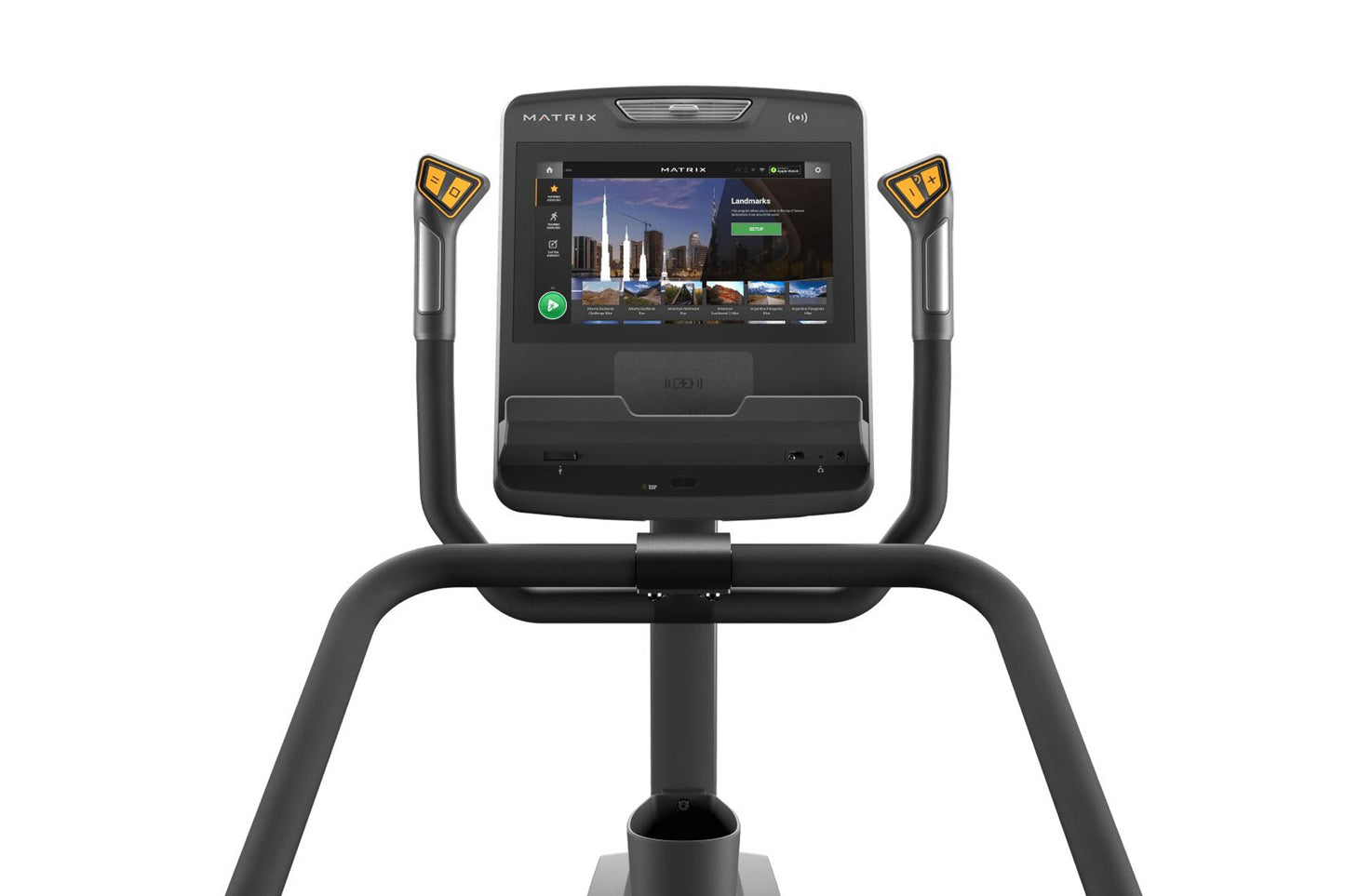 Matrix Endurance Stepper with black frame, dual handles with yellow grips, and interactive touchscreen display showing fitnes