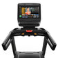 Matrix Endurance Treadmill with black frame, padded handrails, touchscreen display showing fitness content, and red accent de