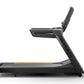 Black Matrix Endurance treadmill with yellow accent strip, digital console, and adjustable handrail on white background