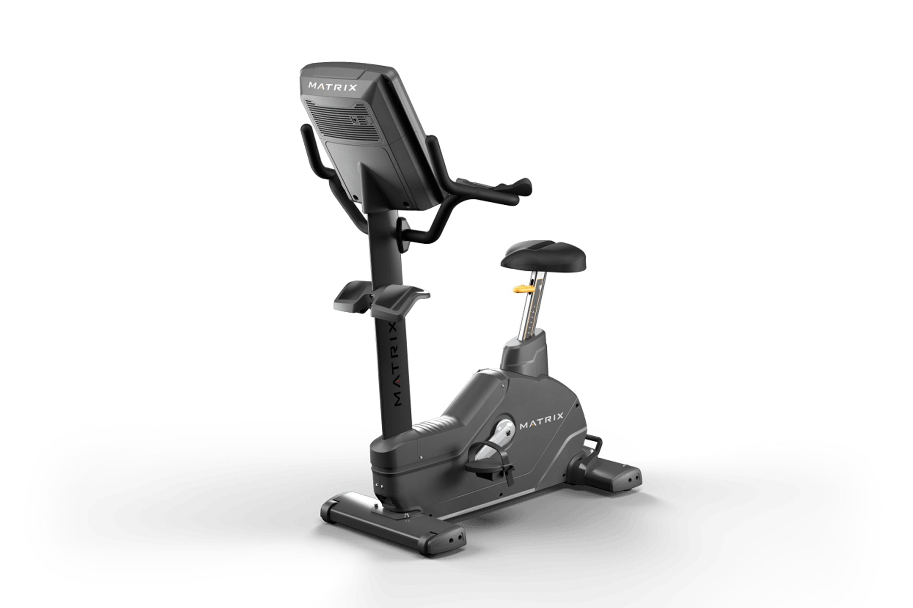 Matrix Endurance upright stationary exercise bike with black frame, digital console, handlebars, and padded seat on white bac