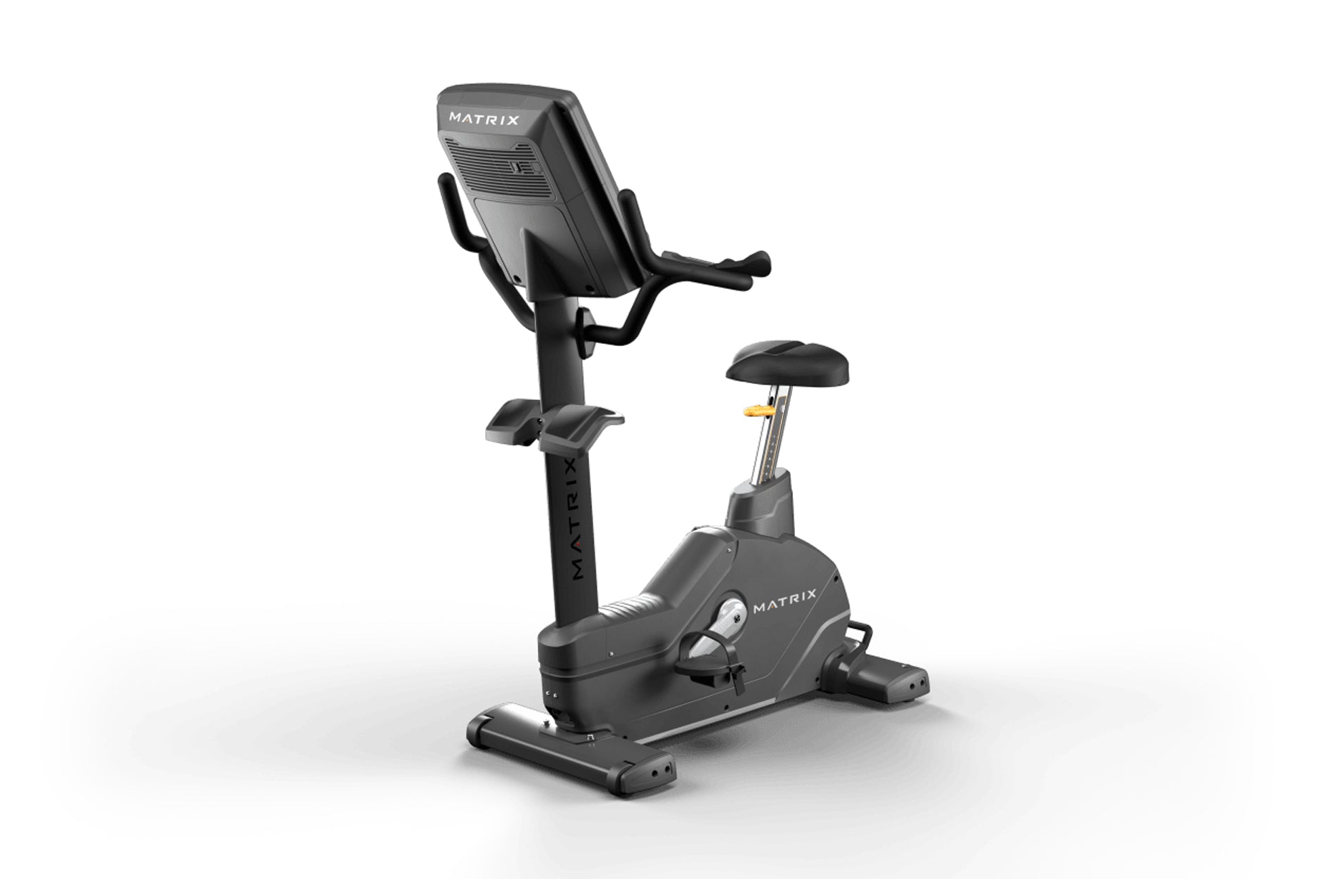 Matrix Endurance black upright exercise bike with digital display, handlebars, and padded seat on white background
