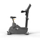 Matrix Endurance upright exercise bike with gray frame, black seat and handlebars, on white background
