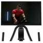 Matrix ICR50 stationary exercise bike with black frame and curved handlebar, console display showing cyclist in red shirt