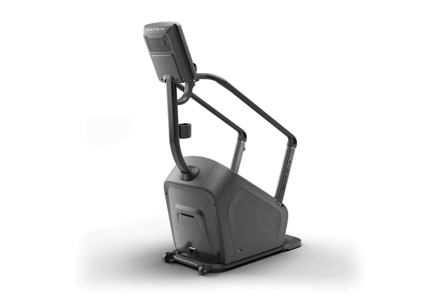 Matrix Lifestyle ClimbMill stair climber machine in charcoal gray with black frame and digital console display, isolated on w
