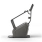 Matrix Lifestyle ClimbMill, dark gray upright climbing machine with extended handles and footrest on white background