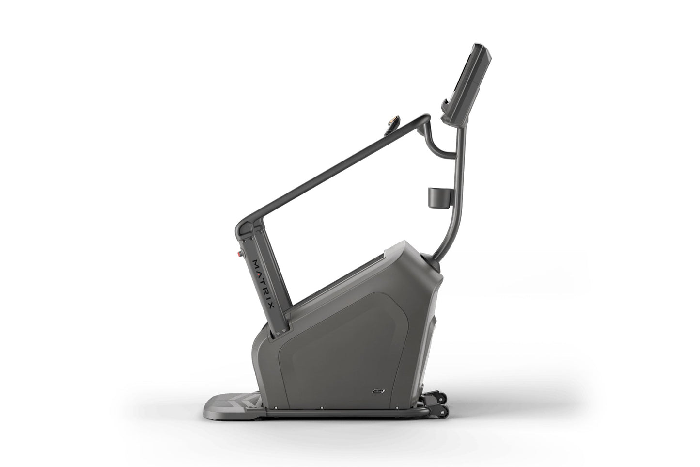 Matrix Lifestyle ClimbMill, dark gray upright climbing machine with extended handles and footrest on white background
