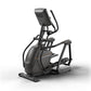 Black Matrix elliptical machine with digital display console, dual handles, and extended foot pedals on white background