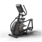 Matrix black elliptical machine with digital display console, curved pedals, and handlebar grips on white background