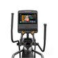 Matrix Lifestyle elliptical machine with black and gray frame, dual moving arms, foot pedals, and digital touchscreen console