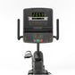 Matrix recumbent exercise bike with digital display showing green readout, control panel with buttons, black frame, and foot 