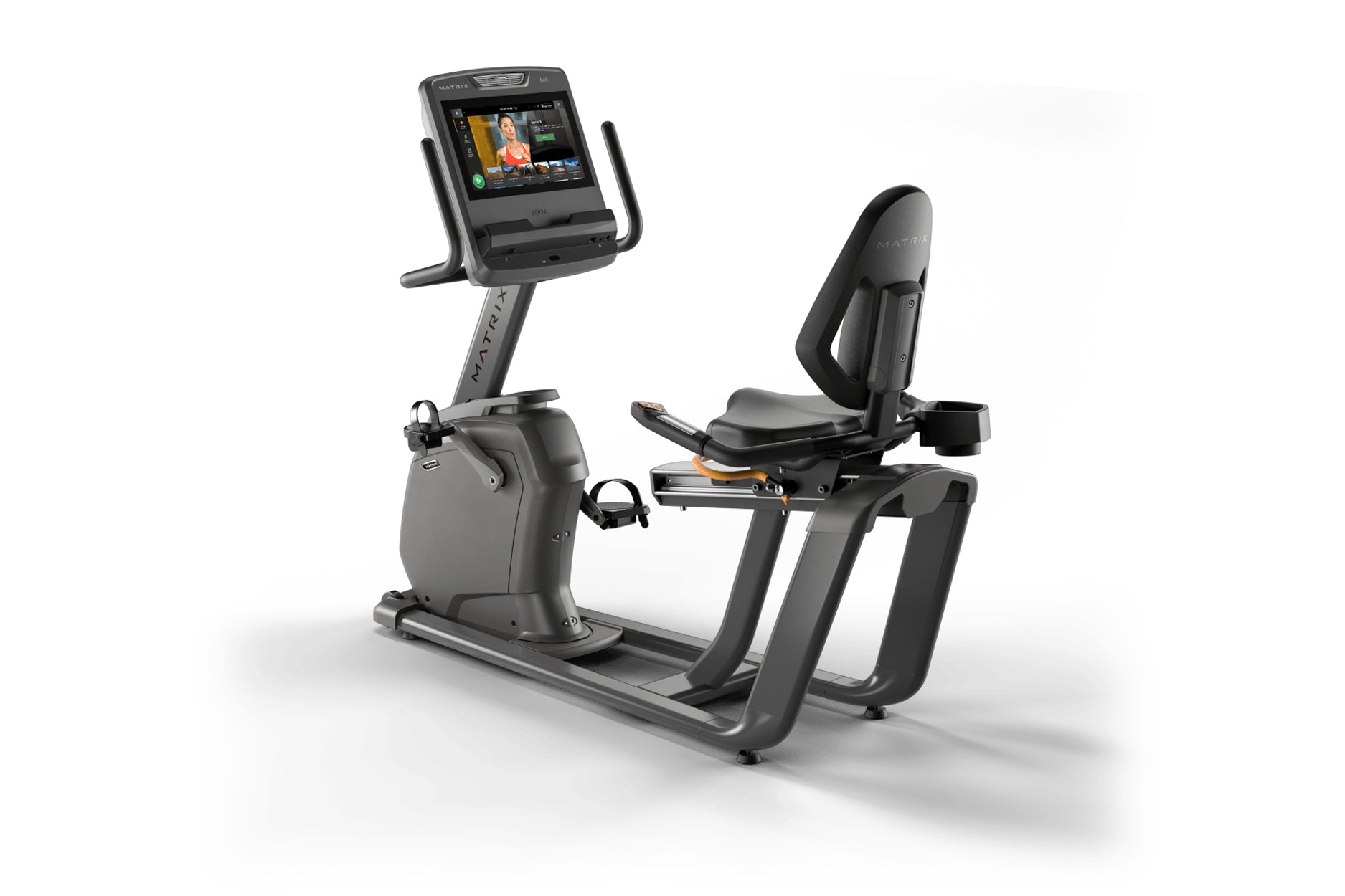 Black and gray Matrix recumbent exercise bike with digital display screen and padded seat, shown on white background