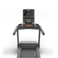 Black Matrix treadmill with digital console display showing workout metrics, handrails, and running belt on white background