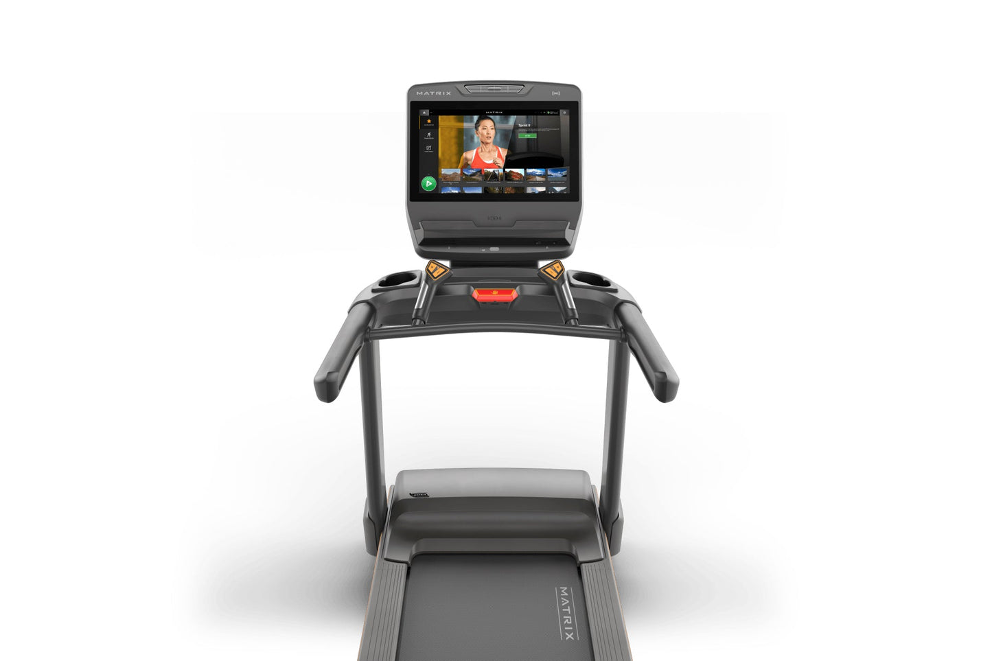 Matrix Lifestyle Treadmill with integrated touchscreen display showing fitness class content, gray frame with dual handles an
