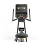 Matrix upright exercise bike with black frame, digital display showing 2059 calories, dual handlebars, padded seat, and gold 