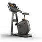 Matrix Lifestyle upright exercise bike with touchscreen display, black seat, handlebars, and gray frame on white background