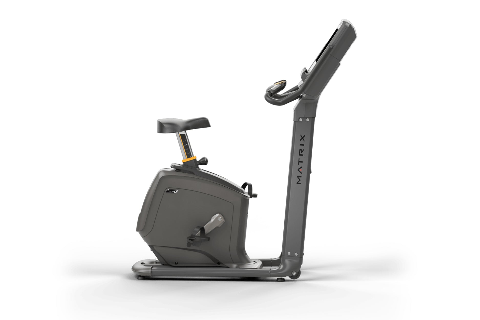 Matrix Lifestyle upright exercise bike with black frame, padded seat, handlebar display, and gold accents on white background