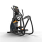 Black and orange elliptical trainer with digital display console and dual handles on white background