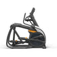Black and gray elliptical trainer with orange accents, digital display, and movable arms on white background