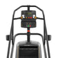 Matrix ClimbMill stair climbing machine with black frame, digital display showing time and metrics, and control console with 