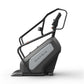 Matrix Performance ClimbMill exercise machine with black frame, gray seat console, and adjustable handlebars on white backgro