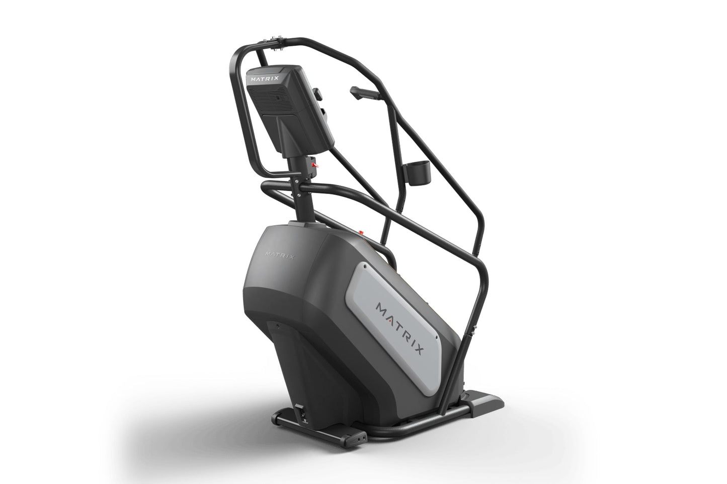 Matrix Performance ClimbMill with black and gray frame, handrails, and digital console on white background
