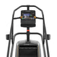 Matrix Performance ClimbMill with black frame, digital touchscreen display, and gray stepping platform on white background