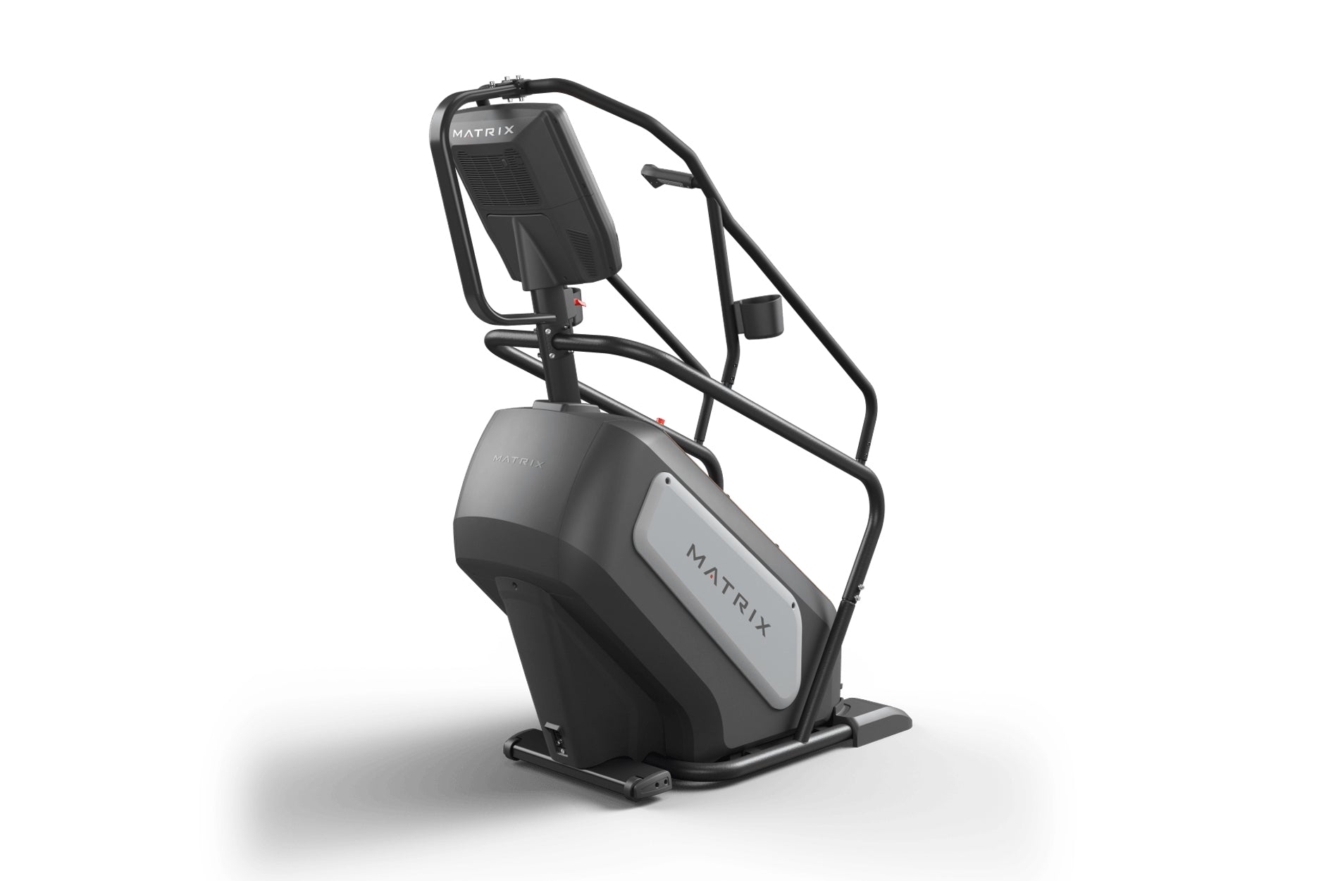 Black and gray Matrix ClimbMill stair climbing exercise machine with handrails and digital display on white background