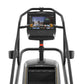 Black and gray Matrix ClimbMill with digital display showing city skyline, handrails, and footplate on white background