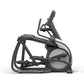 Black and gray elliptical exercise machine with handlebar and foot pedals on white background