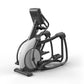 Matrix Performance Suspension Elliptical with black frame, white wheel, and digital display on white background