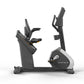 Matrix Performance Hybrid Cycle recumbent stationary bike with gray and black frame on white background