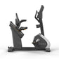 Matrix Performance Hybrid Cycle stationary exercise bike with gray and black frame, adjustable seat and handlebars on white b