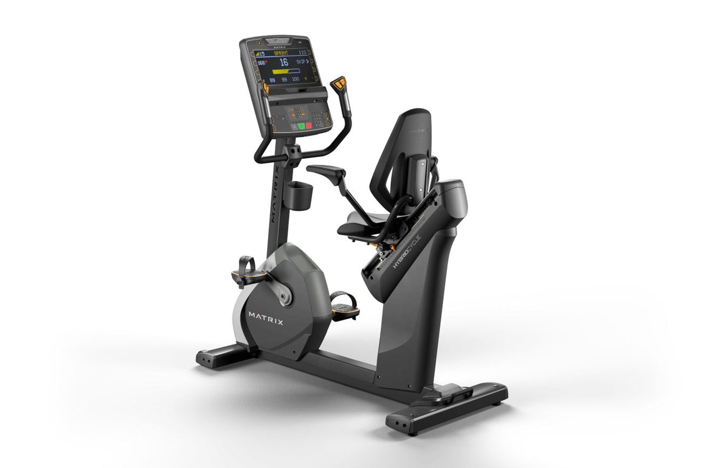 Black Matrix recumbent exercise bike with digital console display, foot pedals, and cushioned seat on white background