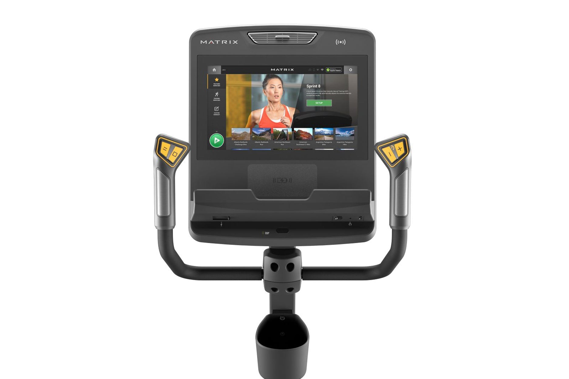 Matrix Performance Hybrid Cycle with touchscreen display showing fitness class, dual yellow and gray handlebar controls, and 