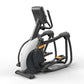 Matrix Performance Lower Body Ascent Elliptical Trainer with white and black frame, digital console, and orange accents on pe