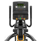 Matrix black and gold elliptical trainer with digital display showing workout metrics, dual handles, and foot pedals on white