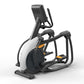 Matrix Performance Lower Body Ascent Elliptical Trainer with black frame, white shroud, orange accents, and digital display o