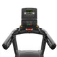 Matrix Performance Plus treadmill with black and gray frame, digital console displaying time and metrics, padded handrails, a