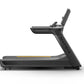 Matrix Performance Plus black treadmill with yellow accent stripe, digital display, and adjustable incline on white backgroun