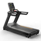 Black and gray commercial treadmill with digital display console, dual handrails, and orange accent stripe on running deck