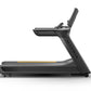 Dark gray commercial treadmill with yellow accent stripe, digital console, and adjustable handrails on white background
