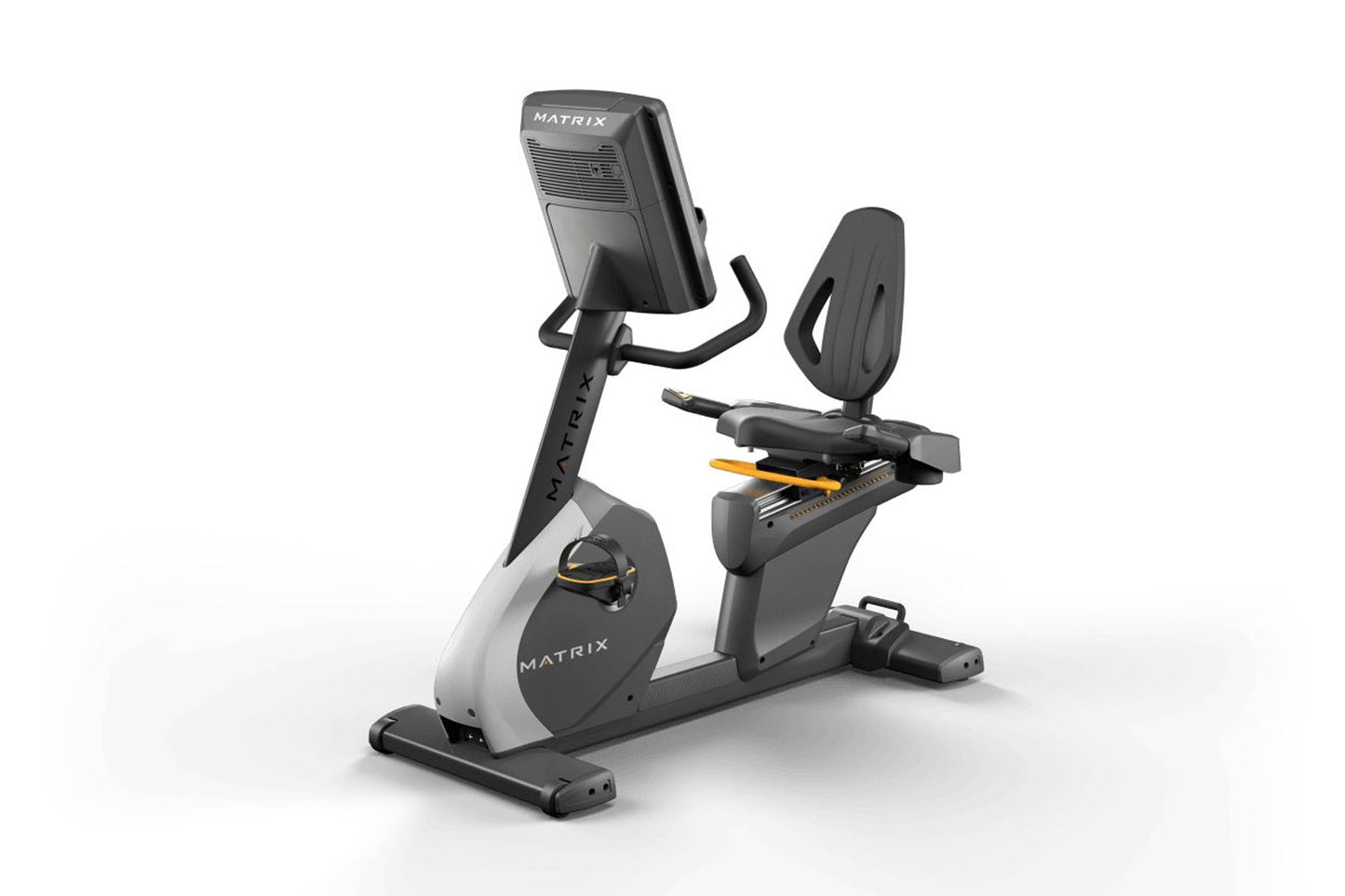 Matrix black and gray recumbent exercise bike with digital console, padded seat, and footrest on white background