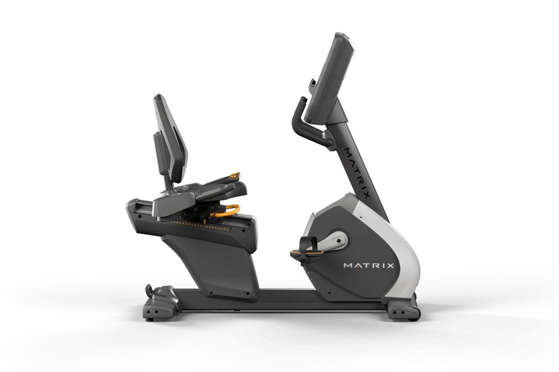 Matrix black and gray recumbent exercise bike with digital display and adjustable seat, shown from side angle on white backgr