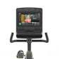 Matrix performance recumbent exercise bike with black frame, curved handlebars, and digital touchscreen display showing worko