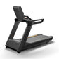 Matrix Performance Treadmill with gray and black frame, digital display console, and wide running belt on white background