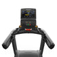 Matrix Performance Treadmill with black frame, digital display showing sprint workout metrics, and gray textured handrails on