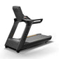 Matrix Performance Treadmill with black frame, gray running belt with yellow accents, and adjustable backrest on white backgr