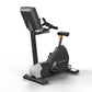 Matrix Performance Upright Cycle with black and white frame, digital display console, adjustable seat, and handlebars on whit